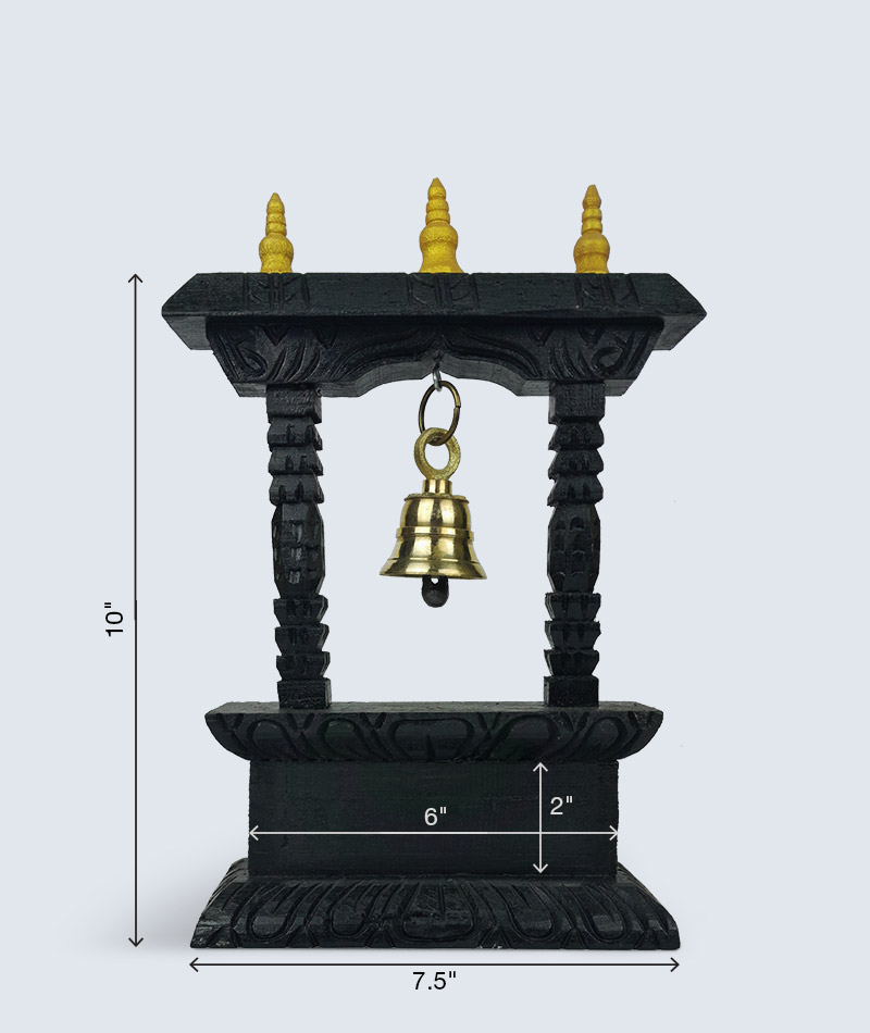 Brass bell close-up in wooden shrine stand