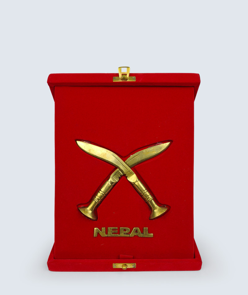 Red velvet box open interior, kukri emblem design